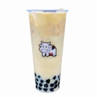 2.House Jasmine Milk Tea w/ Boba · Includes boba (Honey Tapioca)