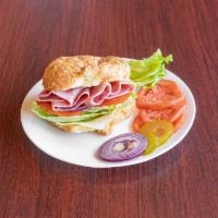 Ham and Cheese Sandwich Lunch · Your choice of croissant or bagel. Sandwich include Tomato, lettuce, pickle, onion. Dressing...