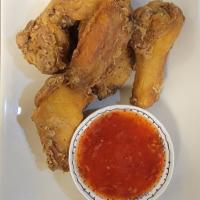 A4. Spicy Chicken Wings · 6 pieces. Deep-fried chicken marinated in sweet spicy sauce.

