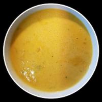 Coconut Soup · 16 oz. Cup. Coconut milk cooked with methi leaves (fenugreek) and medium spices.