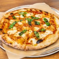 Margherita Pizza · Tomato sauce, mozzarella, and basil.
