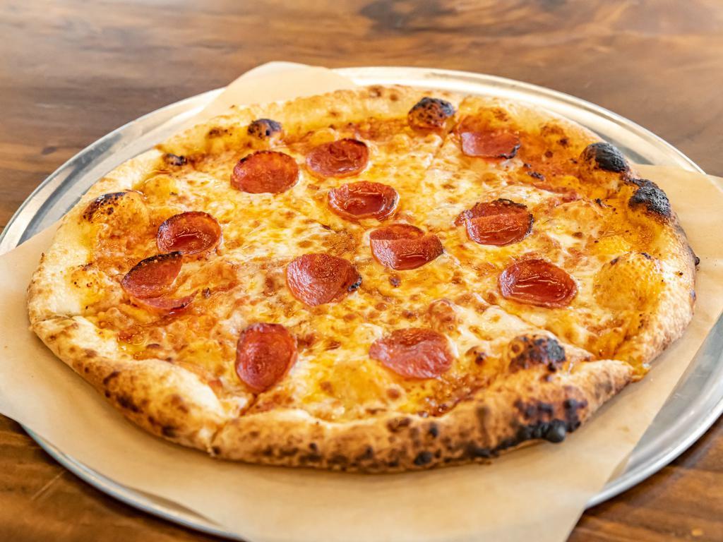 Pepperoni Pizza · Tomato sauce, mozzarella, and cured pepperoni.