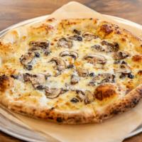 Mushroom and Truffle Pizza · Cremini mushrooms, Gruyere, mozzarella, Parmesan, and truffle oil.