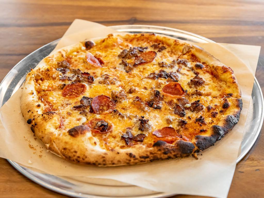 Meat Lovers Pizza · Tomato sauce, bacon, cured pepperoni, Italian sausage, and mozzarella.