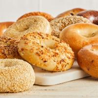 Baker's Dozen · 13 of our fan's favorite fresh-baked, New York style bagels: 3 Plain, 2 Cinnamon Raisin, 2 E...