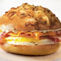 Farmhouse · Perfectly seasoned, fresh-cracked eggs, slices of savory peppered bacon, ham, cheddar cheese...