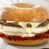 Skinny Zesty Egg White · A skinny Plain bagel stacked with seasoned egg whites, turkey sausage, Swiss cheese and our ...