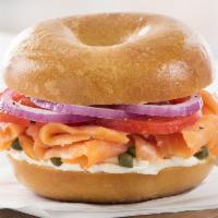 Smoked Salmon · Delicious Atlantic smoked salmon, Plain Cream Cheese, fresh tomato, red onions, and capers o...