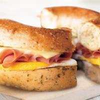Egg, Ham & Cheese · A perfectly seasoned fresh-cracked egg along with thinly sliced ham topped with your choice ...