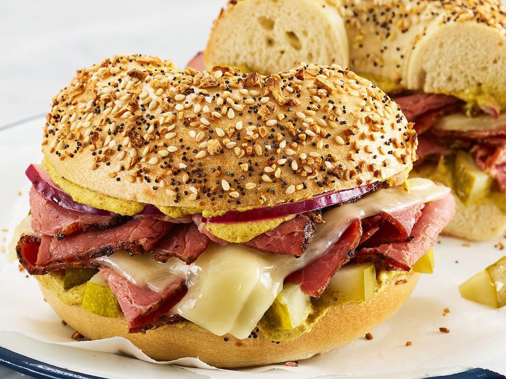 Hot Pastrami · Pastrami, Swiss cheese, sliced red onion, diced pickles, and spice brown mustard, toasted and served up hot on an Everything Bagel.
