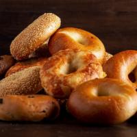 Baker's Dozen Bagels · Our Baker's Dozen bagels only comes with an assortment of 3 Plain, 2 Cinnamon Raisin, 2 Choc...