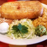 Chimichanga Dinner · A deep fried giant flour tortilla filled with beans, cheese and your own choice of meat: chi...