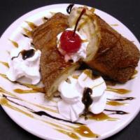 Xango · A lightly breaded cheese cake roll, deep fried and rolled in cinnamon and sugar.