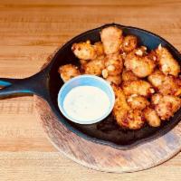 Cheese Curds · The cheesehead's best. Served with dipping sauce.