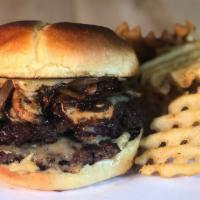 Steakhouse Burger · Swiss, sauteed mushrooms, carmealized onions, A1 sauce, and garlic aioli.