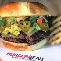 Tex Mex Burger · Pepper Jack, avocado pulp, pico de gallo, jalapenos, romaine, and chipotle mayo spread.