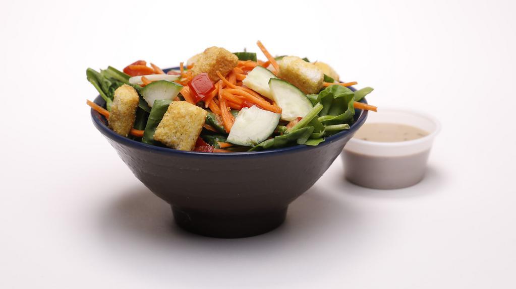 Side Salad · Spinach, cucumbers, tomatoes, croutons and dressing.