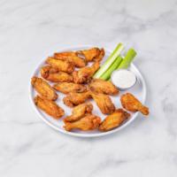 12 Wings · Includes 2 flavors and 2 dressings.