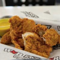 Hand-Breaded Chicken Tenders · Served with honey mustard. Tossed with any sauce add for additional charge.