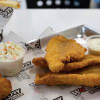 Catfish Fillet · 100% American catfish. Hand-breaded and served with our signature fries, home-made coleslaw,...
