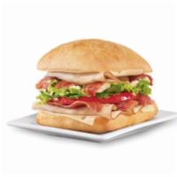 Dairy Queen Bakes Turkey BLT Sandwich · Deli-style turkey, white cheese and hickory smoked bacon topped with mayo, thick-cut tomato ...