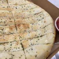 Toarmina Bread · 16 piece breadstick with butter, our own Italian seasoning, and romano cheese.