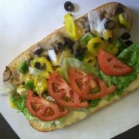 Veggie Sub · Mushrooms, olives, green peppers, mozzarella, lettuce, onion, tomato, and miracle whip.