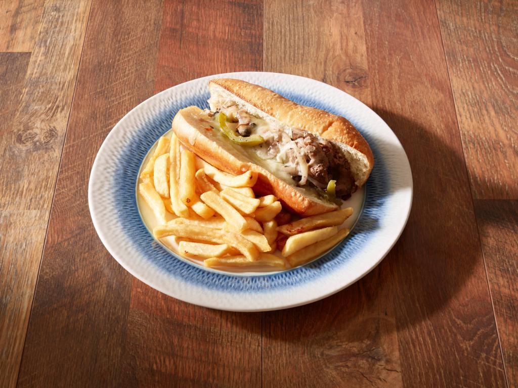 Authentic Philly Cheesesteak Sub · Toasted. Tender steak, green peppers, mushrooms, onions and choice of cheese.