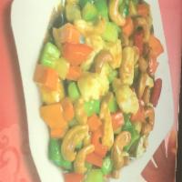 67. Chicken with Cashew Nuts · Served with white rice.