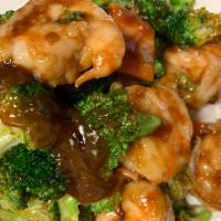 74. Shrimp with Broccoli · Served with white rice.