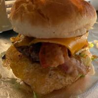 EggTASTIC Burger · 1/4 lb patty, bacon, lettuce, tomato, onion, cheddar cheese, a fried egg & spicy ranch s...
