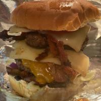 Smash Burger · 2- 1/4 lb patties, lettuce, tomato, sautéed mushrooms & onions, cheddar and provolone ch...