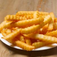 French Fries · Crinkle cut and crisp, they’re the perfect accompaniment to our chicken.