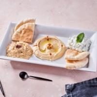 Mezze Platter (V) by SAJJ Mediterranean Express · By SAJJ Mediterranean Express. Pita bread with sides of hummus, babaganoush, and tzatziki. C...