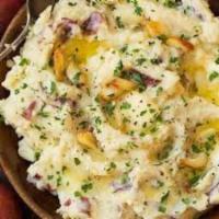 Garlic Mashers · Red potatoes, garlic, butter, cream