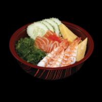 Chirashi Bowl · Salmon, shrimp, tamago, tobiko, cucumber, and seaweed salad over rice.