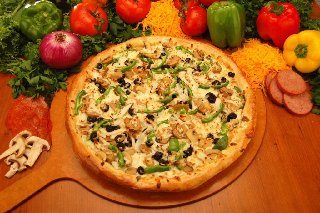 Veggie Pizza · A garden delight topped with all the veggies, green peppers, onions, mushrooms, black olives, and jalapenos (on request)
.