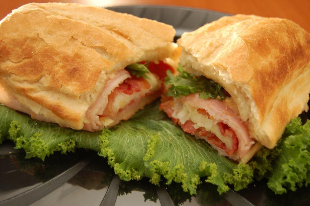 Club Sandwich · Alpine dressing, mozzarella cheese, ham, and bacon.