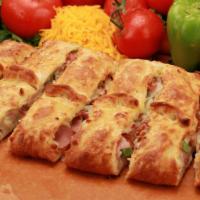 Stromboli · A golden brown crust studded with Canadian bacon, bacon, green peppers, onions, cheese, and ...