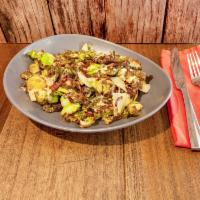Crispy Brussels Sprouts  · Tossed with balsamic vinaigrette, bacon, shaved Parmesan and fried sage.
