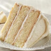 Slice: White Chocolate · Our signature flavor! We melt real white chocolate and fold it into the cake batter for a ri...