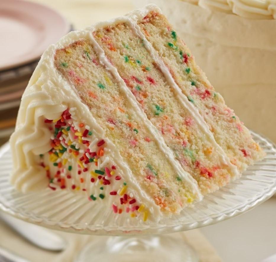 Slice: Birthday Cake · It's festive AND delicious! Sprinkles are for winners and this cake has them in the cake and on top!