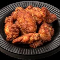 Traditional Wings - 16 Piece · New! Traditional bone-in breaded wings. Order plain or toss 'em in 6 sauces. Select from 8pc...