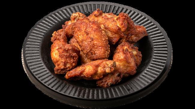 Traditional Wings - 8 Piece · New! Traditional bone-in breaded wings. Order plain or toss 'em in 7 sauces. Select from 8pc (1 sauce included) or 16 pc (up to 2 sauces included). Dipping sauces available for extra charge.