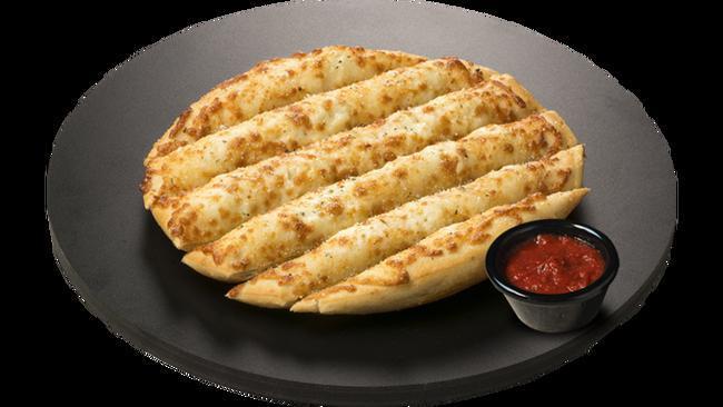 Ranch Stix with Cheese - Small · Made from our skillet dough and topped with cheese, herbs and spices. Marinara Sauce included.