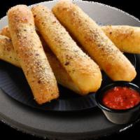 Breadsticks · New! Six individual breadsticks topped with a blend of herbs and spices. Marinara Sauce incl...