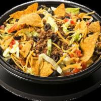 Taco Salad · Taco Chips, Lettuce, Beef, Cheddar Cheese, Diced Tomatoes, Black Olive with Taco Sauce and S...