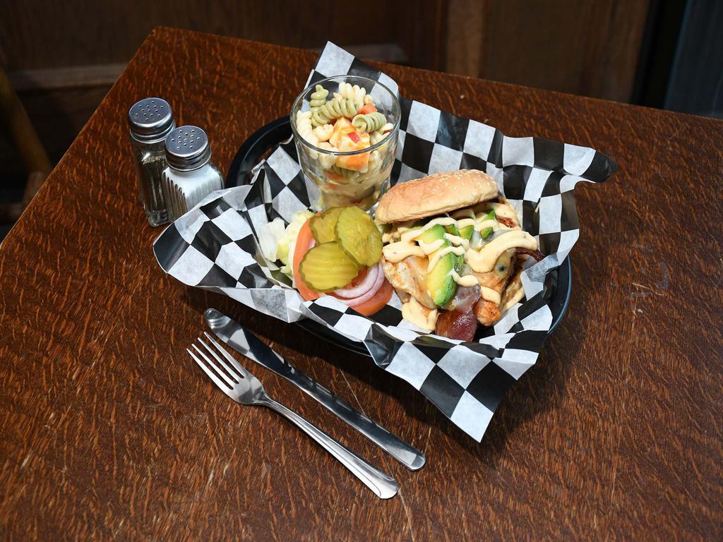 California Chicken Sandwich · Grilled chicken breast, bacon, Swiss, avocado and topped with chipotle mayo. Served with lettuce, tomato, onion and pickles.