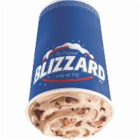 Snickers Blizzard Treat · Signature DQ soft serve blended with snickers and chocolate syrup