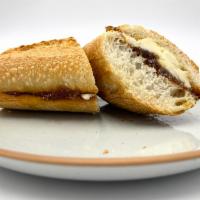 Fig N Brie · Fig Jam Over Brie Spread And Olive Oil On French Baguette